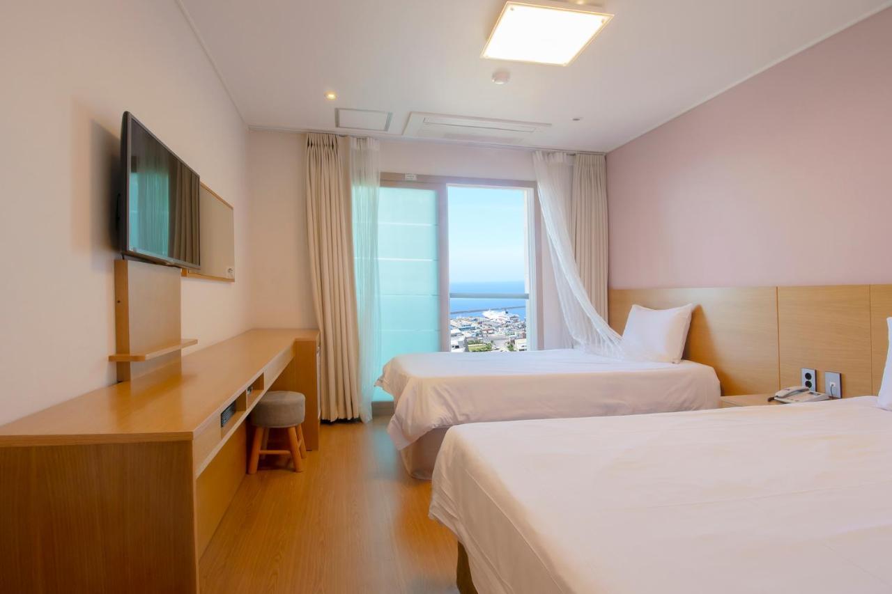 Sims Hotel Jeju Exterior foto